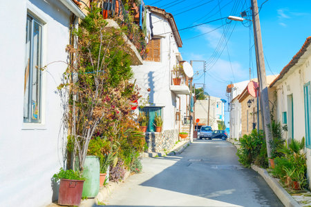 LARNACA, CYPRUS - FEB 17, 2019: Empty street leading to the sea in Larnaca, Cyprusの写真素材