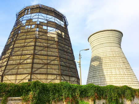 Cooling towers of the cogeneration heat power plant in Kyiv, Ukraine. Industrial USSR buildingsの写真素材