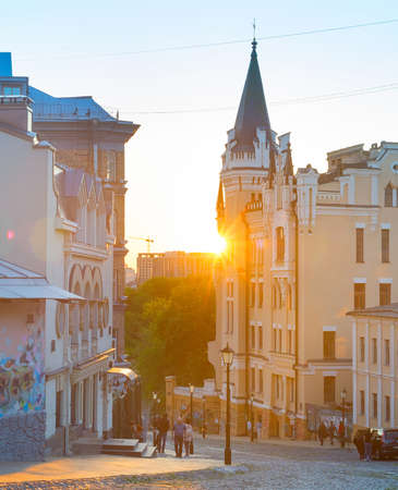 KYIV, UKRAINE -MAY 10, 2020: People walking by Andrews descent at sunset. Andrews descent is a famous tourist destination.のeditorial素材