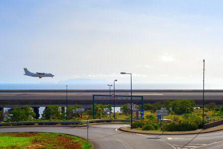 Airplane landing at airport runaway. Funchal, Madeiraの写真素材