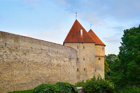 Fortress wall and towers of an Old Town of Tallin in sunset light. Estoniaのeditorial素材
