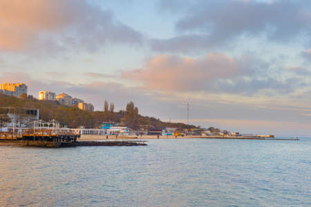 Black sea, beachs and modern seafront building at sunset. Odessa, Ukraineのeditorial素材