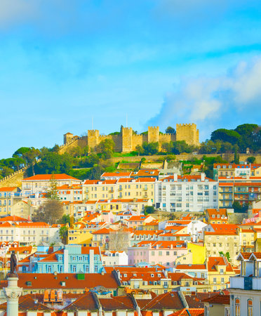 Skyline of Lisbon Old Town with Lisbon Castle on a top of a hill. Portugalのeditorial素材