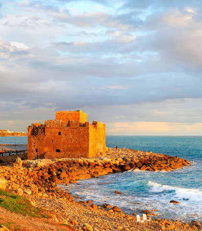 Scenic sunset seascape with clouds and Paphos Harbour Castle view, Cyprusのeditorial素材