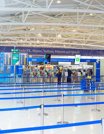 LARNACA, CYPRUS - FEBRUARY 21, 2019: Check-in desks  in terminal of Larnaca International airport, modern interior. Cyprusのeditorial素材