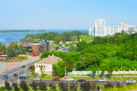 Aerial view Dnipro river, cars on a road and modern apartment buildings. Cherkasy, Ukraineのeditorial素材