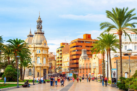 CARTAGENA, SPAIN - NOVEMBER 1, 2021: Tourists walking by city center, colonial archtecture, Municipality of Cartagenaのeditorial素材