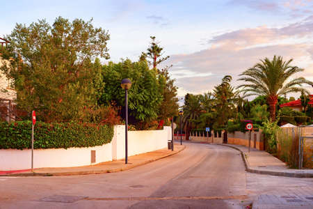 Evening street view in residential area with private houses, Alicante, Sapinの写真素材