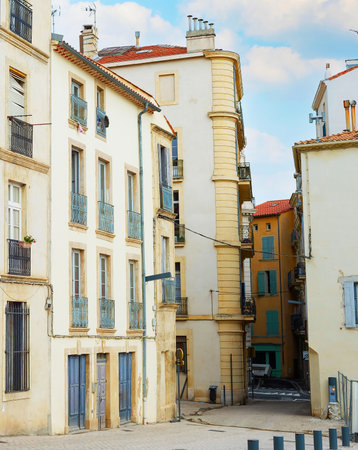 Old town narrow street with traditional architecture buildings , BÐµziers, Franceの写真素材