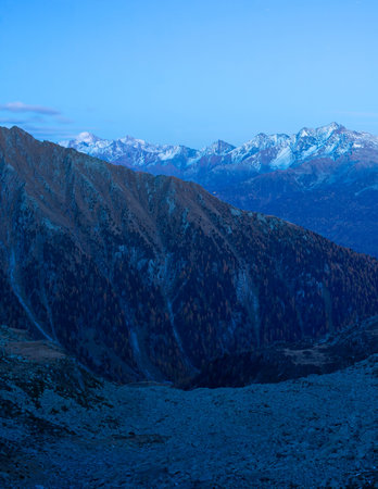 Dusk Alps landscape with mountain snowy peaks in background, Austriaの写真素材