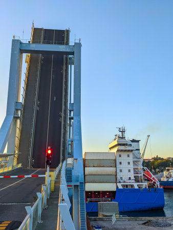 Leixoes port opened drawbridge and ship passing with freight containers, Porto, Portugalの写真素材