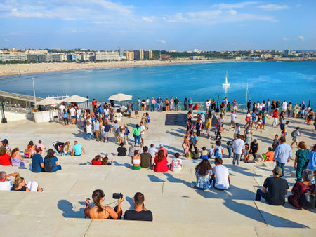 PORTO, PORTUGAL - SEPTEMBER 18, 2022: People at opendoor Port Day, visiting rooftop of Leixoes port cruise terminal, cityscape and Matosinhos beach in bright sunshine in backgroundのeditorial素材