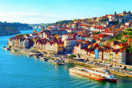 Cityscape of old town by Douro river in bright sunlight, Porto, Portugalの写真素材