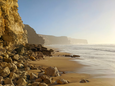 Ocean beach landscape with sand and rocks. Sagres, Algarve, Portugalの写真素材