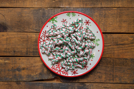 Close up Christmas cookies on holiday plateの写真素材
