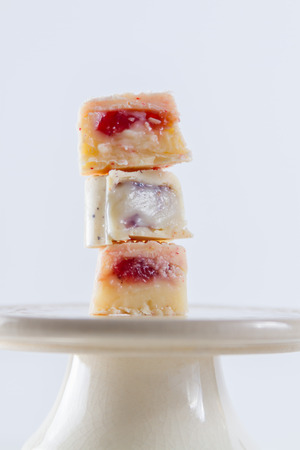 Strawberry chocolate truffles on a white backgroundの写真素材