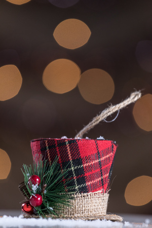 Vertical Xmas Hat Ornament On White Abstract Christmas Background. Selective Focus With Copy Space. Vintage Filter.の写真素材