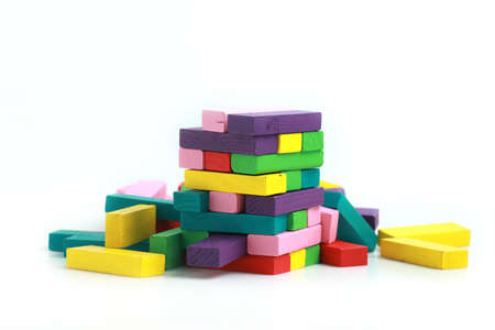 Closeup of colourful wood blocks, stack game on white background.の写真素材