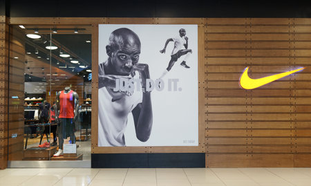 PENANG, MALAYSIA - NOVEMBER 27, 2017: Nike storefront in a shopping mall. Nike is an American...