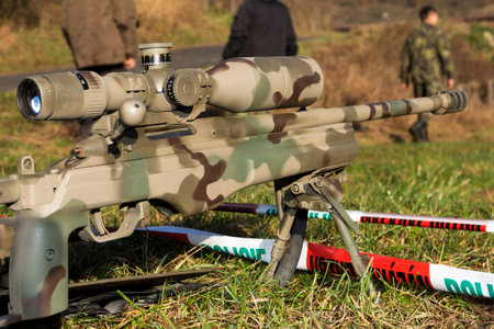 shooter aiming a rifle at a target