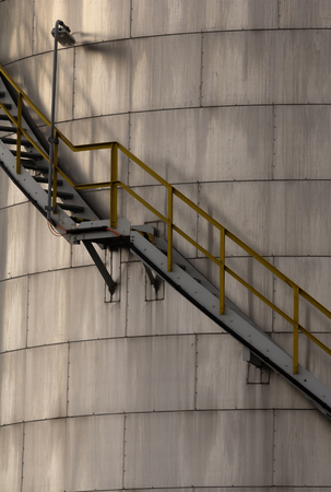 stairs to the tank at a chemical plantの写真素材