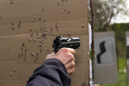 Training of police shooting at a shooting rangeの写真素材