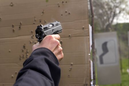 Training of police shooting at a shooting rangeの写真素材