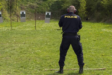 Training of police shooting at a shooting rangeの写真素材