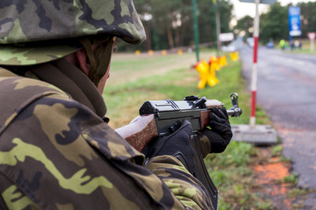soldier in a camouflage suit fights