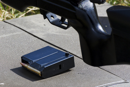 Military sniper aims at a targetの写真素材