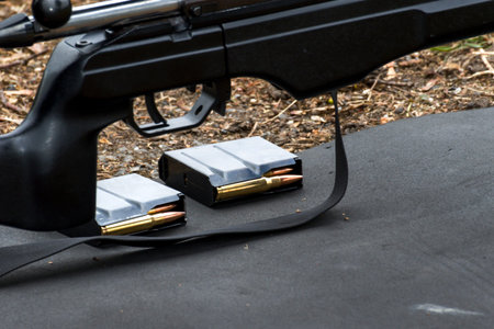 Military sniper aims at a targetの写真素材