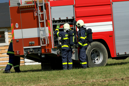Firefighters extinguish fire fire vehicle