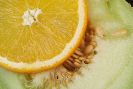 Orange slice on the melonの写真素材