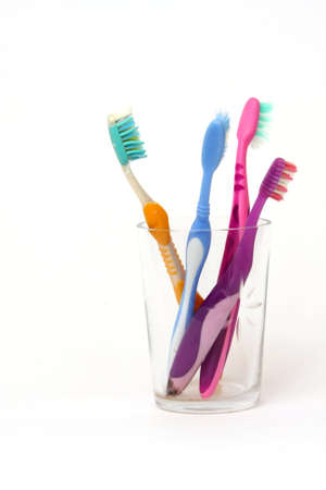 Old toothbrushes in the glassの写真素材