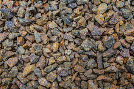 medium size,textured crushed stone,gravel,can be used as background
