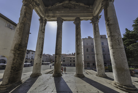 Columns at entrance of the Temple of Augustus in Pulaのeditorial素材