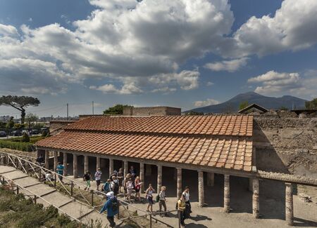 Tourists at Villa dei misteri with Vesuvius in backgroundのeditorial素材