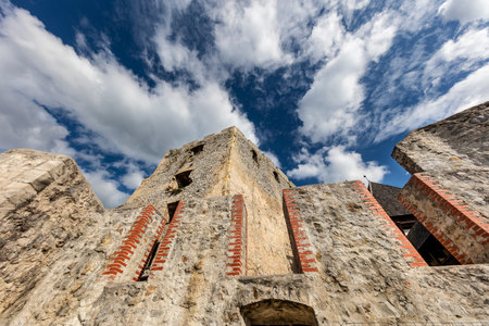 Defensive wall and palace in castle Celje with cloudy background, Sloveniaのeditorial素材