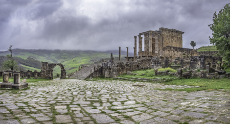 Temple of Gens Septimia and forum in roman town Cuicul at village Djemila, Algeriaの写真素材