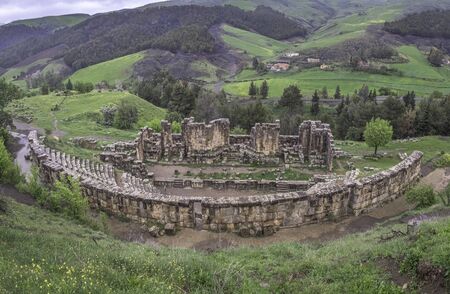 Ruins of theater in roman town Cuicul at village Djemila, Algeriaの写真素材