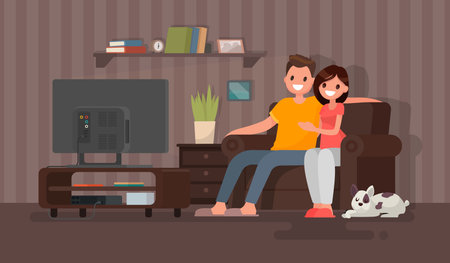 Young couple watching a movie. Man and woman sit on against the TV in the home atmosphere. Vector illustration in a flat styleのイラスト素材