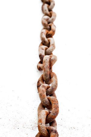 Large old rusty chain on white background. Perspective view
