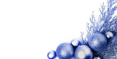 Christmas composition with shiny balls blue toned. Color of the year 2020. Christmas, new year concept. Flat lay, top view, copy spaceの写真素材