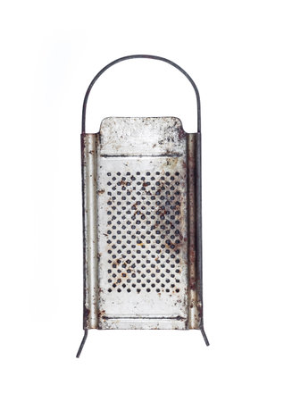 Old metal grater isolated on white backround with clipping pathの写真素材