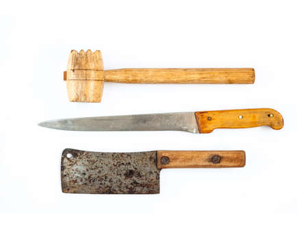 Old kitchen tools (meat hammer, knife and meat cleaver knife) isolated on white backgroundの写真素材