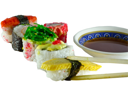 Sushi soy sauce and chopsticks on white backgroundの写真素材