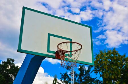 Basketball hoop and beautiful blue skyの写真素材