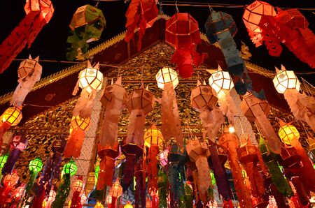 Thai temple and Thai lamp in Loykatong festivalの写真素材