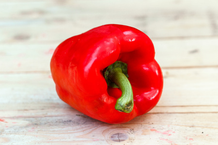 Red pepper on wooden backgroundの写真素材