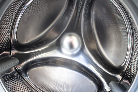 Inside view of opened washing machine. Silver cleanの写真素材